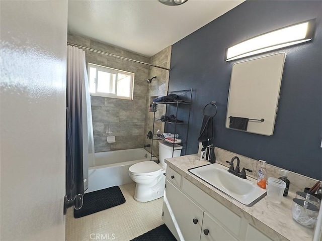 full bathroom with tile patterned flooring, shower / bath combination with curtain, vanity, and toilet