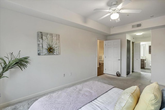 carpeted bedroom featuring ceiling fan