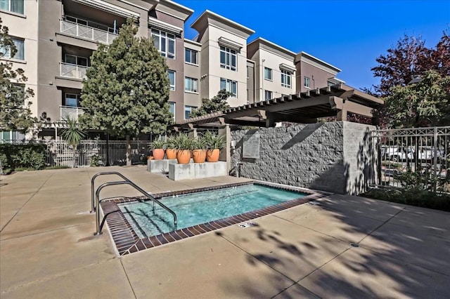 view of pool with a pergola