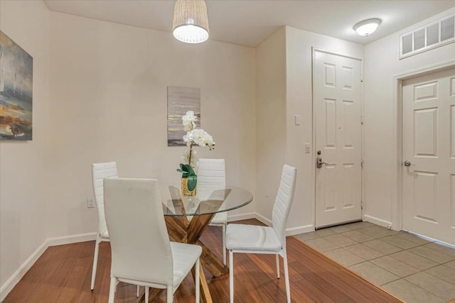 dining room featuring light tile patterned floors