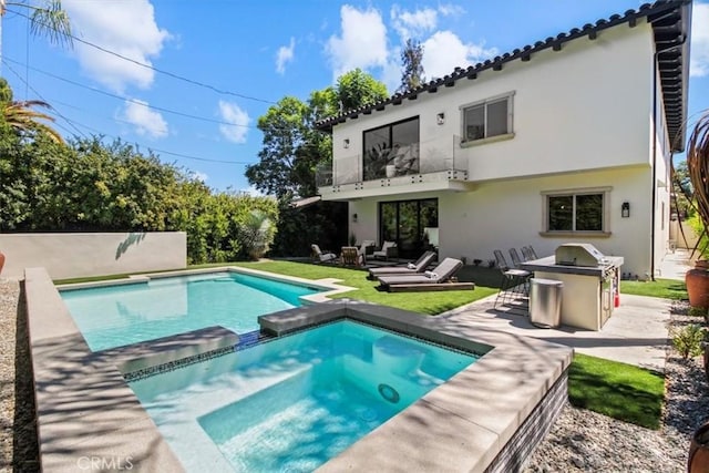 back of house featuring a patio