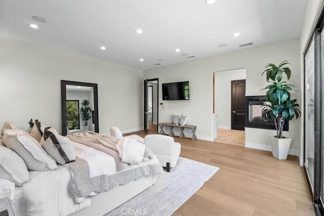 bedroom featuring light wood-type flooring