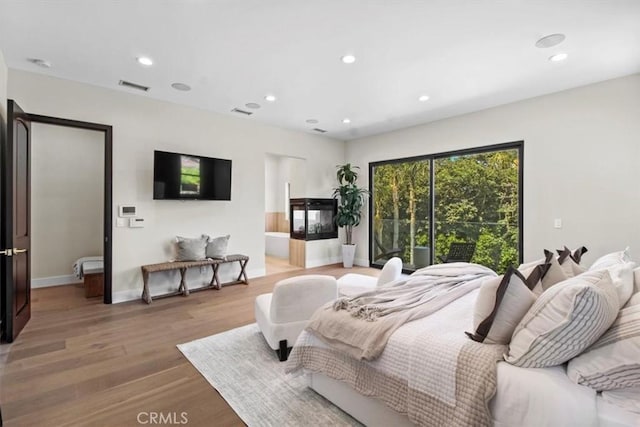 bedroom featuring wood-type flooring