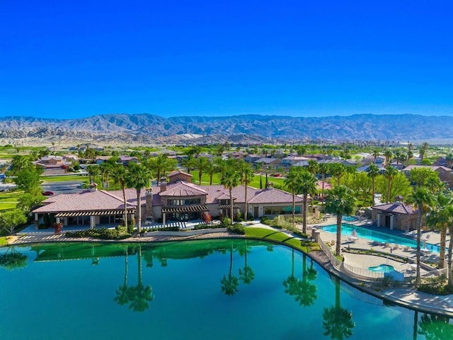 view of pool featuring a water and mountain view