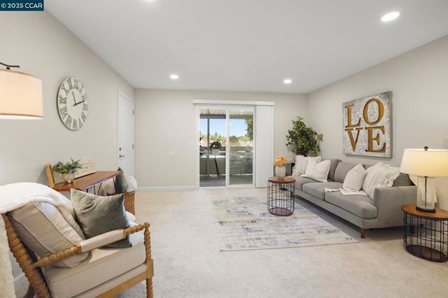 living room featuring light carpet