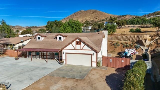 view of front of house with a mountain view and a garage