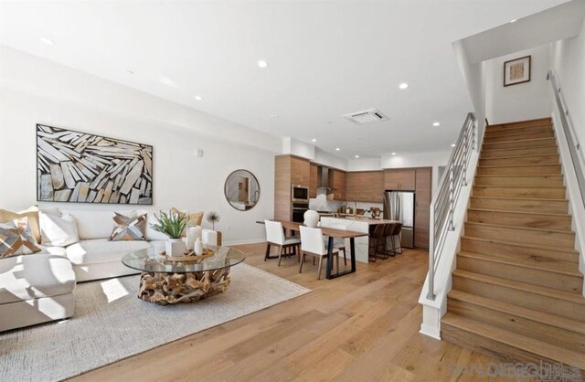 living room featuring light hardwood / wood-style floors