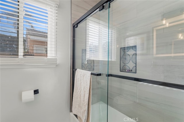 bathroom with an enclosed shower