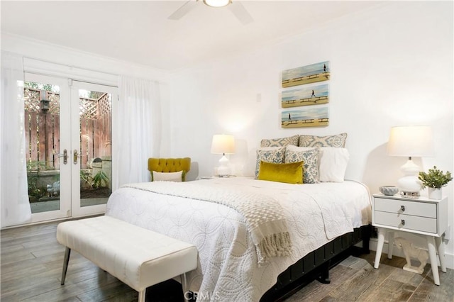 bedroom with ceiling fan, access to outside, wood-type flooring, ornamental molding, and french doors