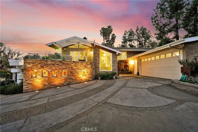 view of front of property featuring a garage