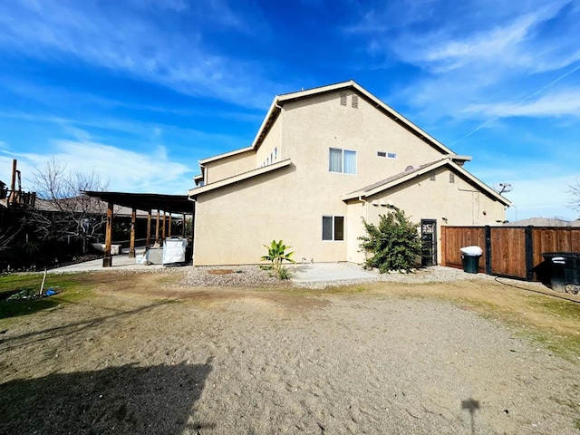 view of property exterior featuring a patio