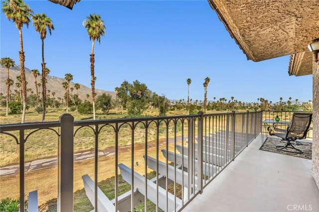 balcony featuring a mountain view