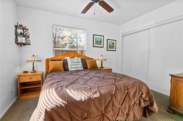 carpeted bedroom with ceiling fan and a closet