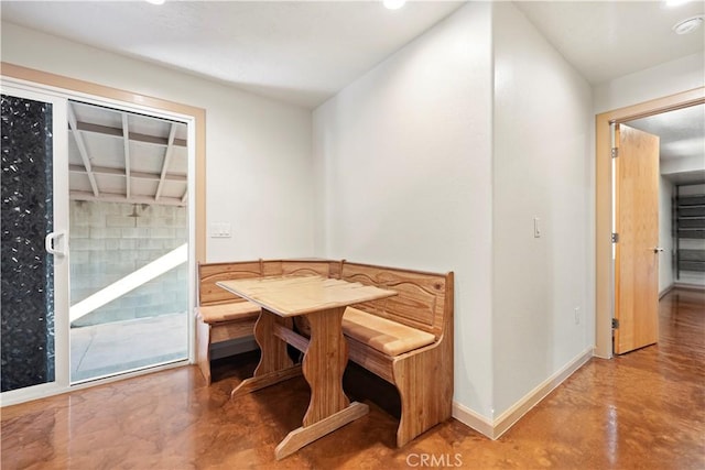 dining area with concrete floors