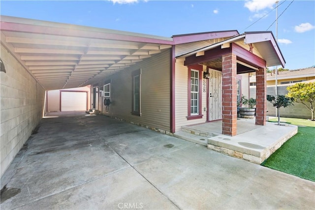 view of side of home featuring a carport