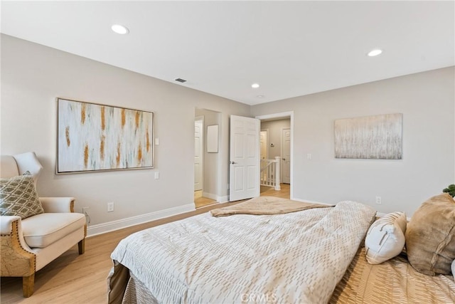 bedroom featuring light wood-type flooring