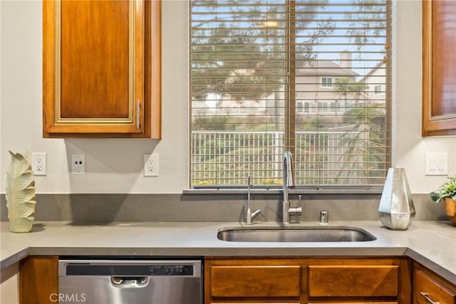 kitchen featuring sink and dishwasher