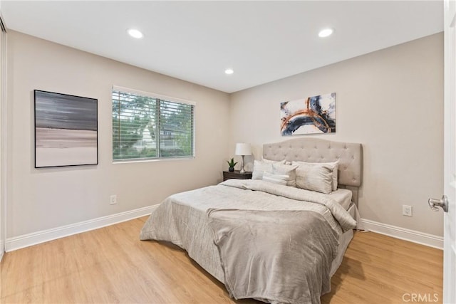 bedroom featuring light hardwood / wood-style flooring