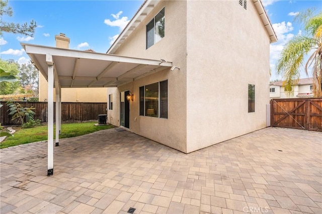 rear view of house with a patio area