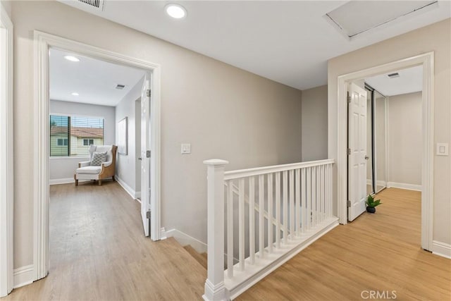 hallway featuring light hardwood / wood-style flooring