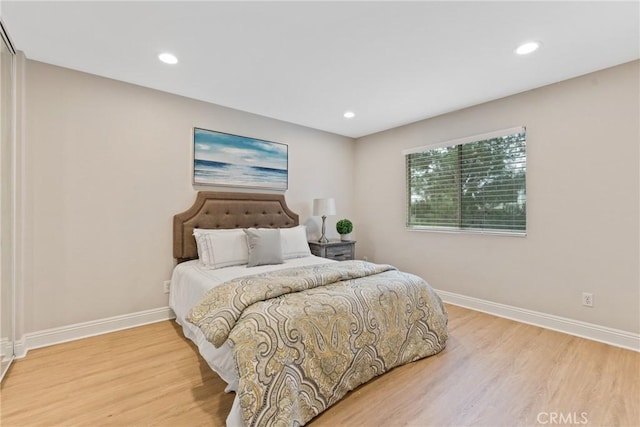 bedroom featuring light hardwood / wood-style flooring