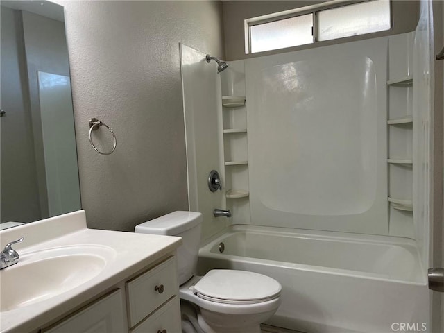 full bathroom with vanity, tub / shower combination, and toilet