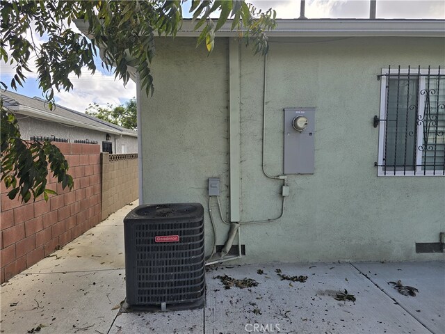 view of home's exterior featuring a patio and central air condition unit