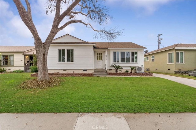 ranch-style home with a front yard