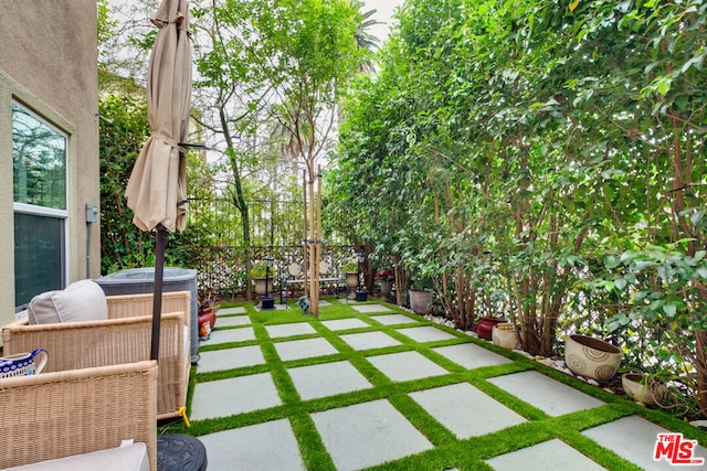 view of patio featuring cooling unit