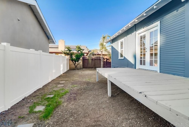 view of yard with a deck