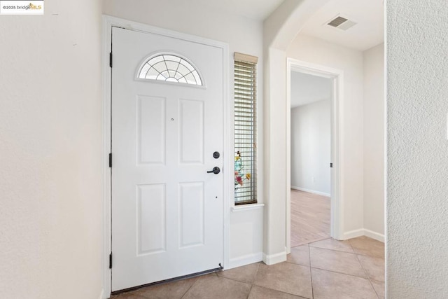 view of tiled foyer