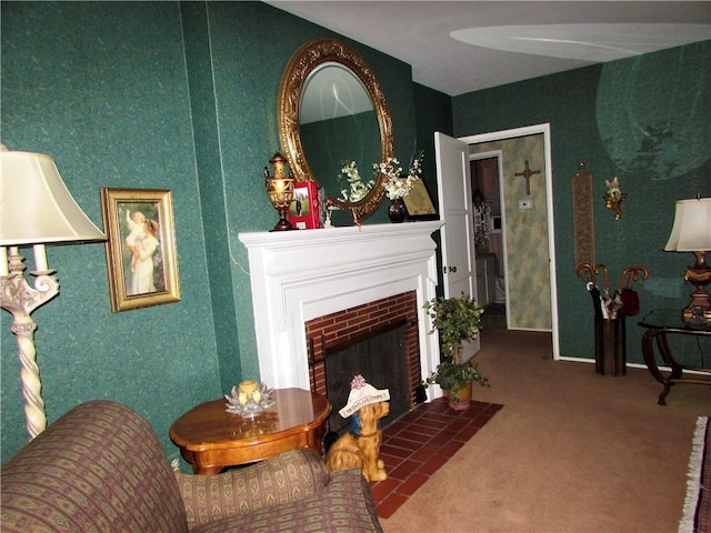 living area featuring a brick fireplace and carpet flooring