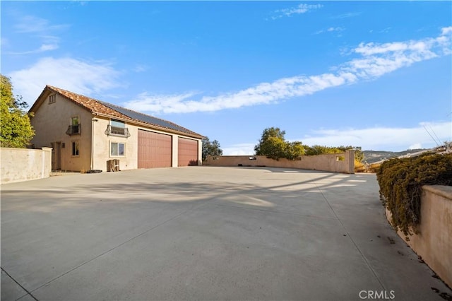 exterior space with a garage