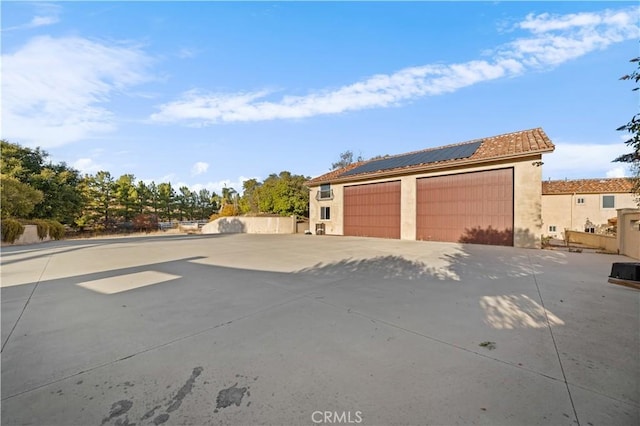 garage featuring solar panels