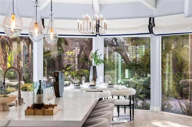 sunroom with a notable chandelier