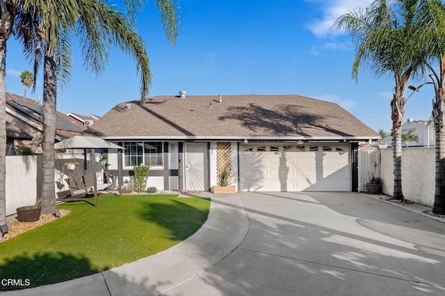 ranch-style house with a front lawn and a garage