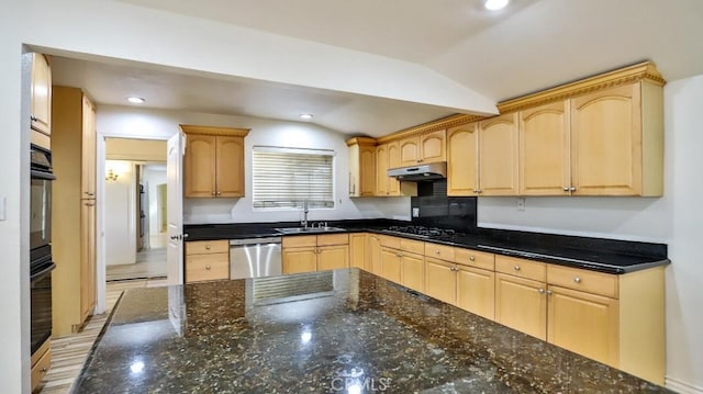 kitchen featuring sink, light brown cabinets, black appliances, and vaulted ceiling