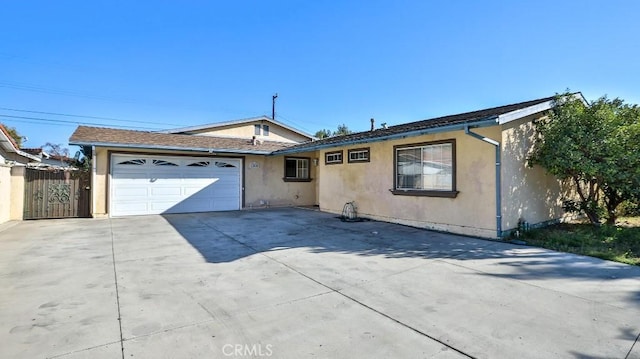 single story home featuring a garage