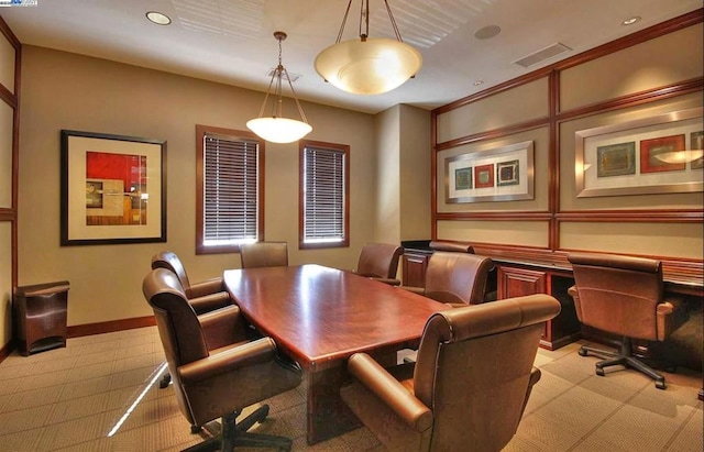 dining room with light carpet