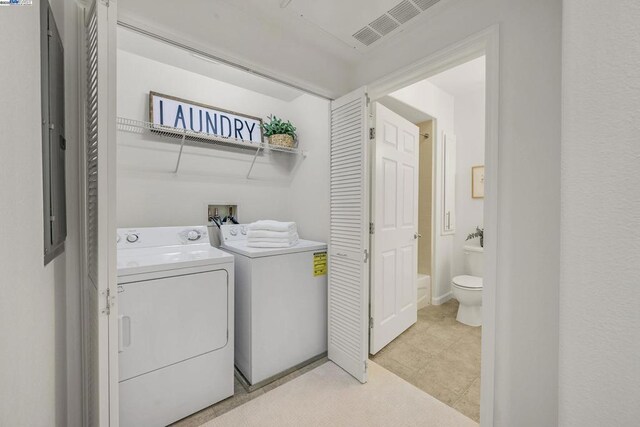 laundry room featuring independent washer and dryer