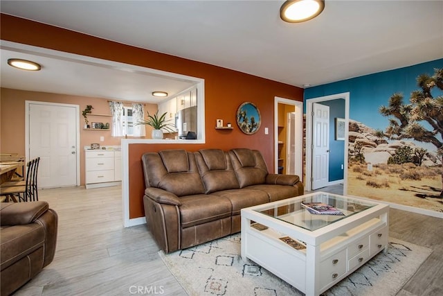 living room with light hardwood / wood-style floors