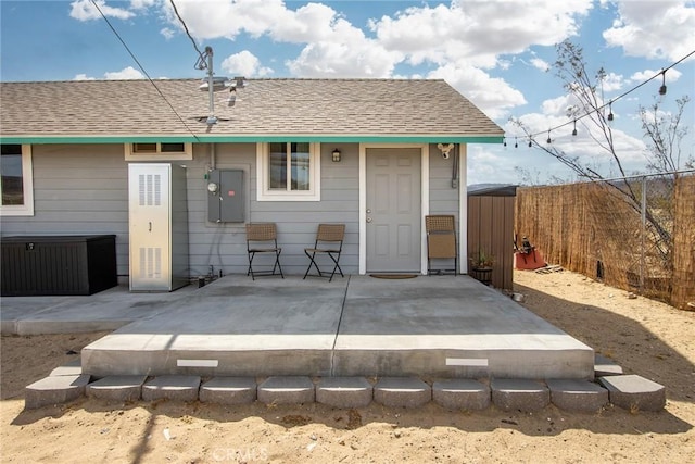 rear view of house with a patio