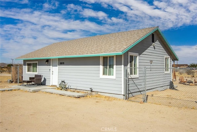 rear view of house with a patio area