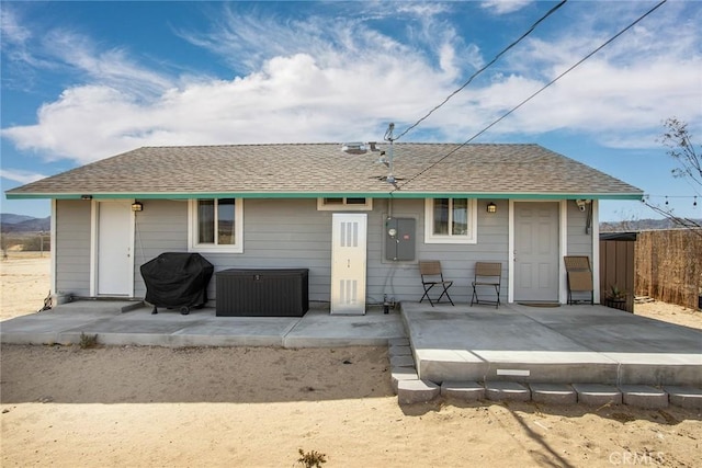 back of property featuring a patio area