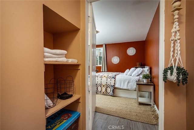 bedroom featuring hardwood / wood-style floors