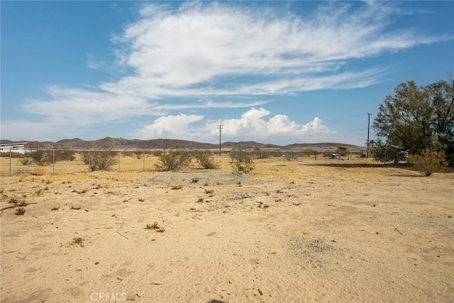 property view of mountains featuring a rural view