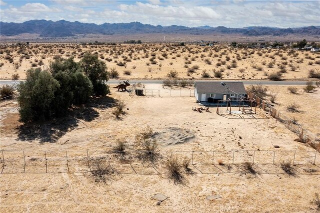 property view of mountains featuring a rural view