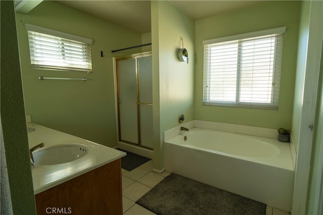 bathroom featuring vanity, tile patterned floors, and independent shower and bath