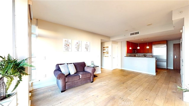 living room featuring light hardwood / wood-style flooring