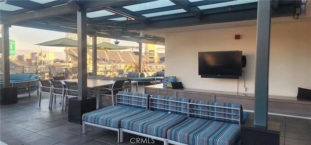 patio terrace at dusk with an outdoor hangout area